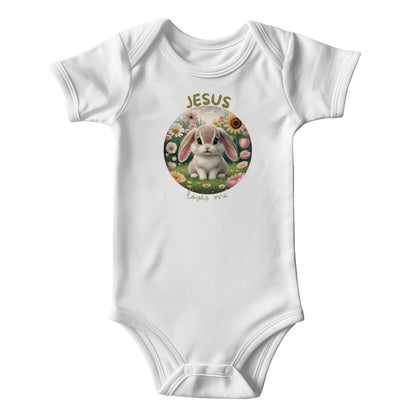 Jesus Loves Me Christian bodysuit with bunny in a flower garden.
