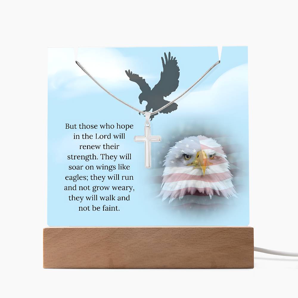 Eagle cross necklace plaque with Isaiah 40:31 in multi-color light.
